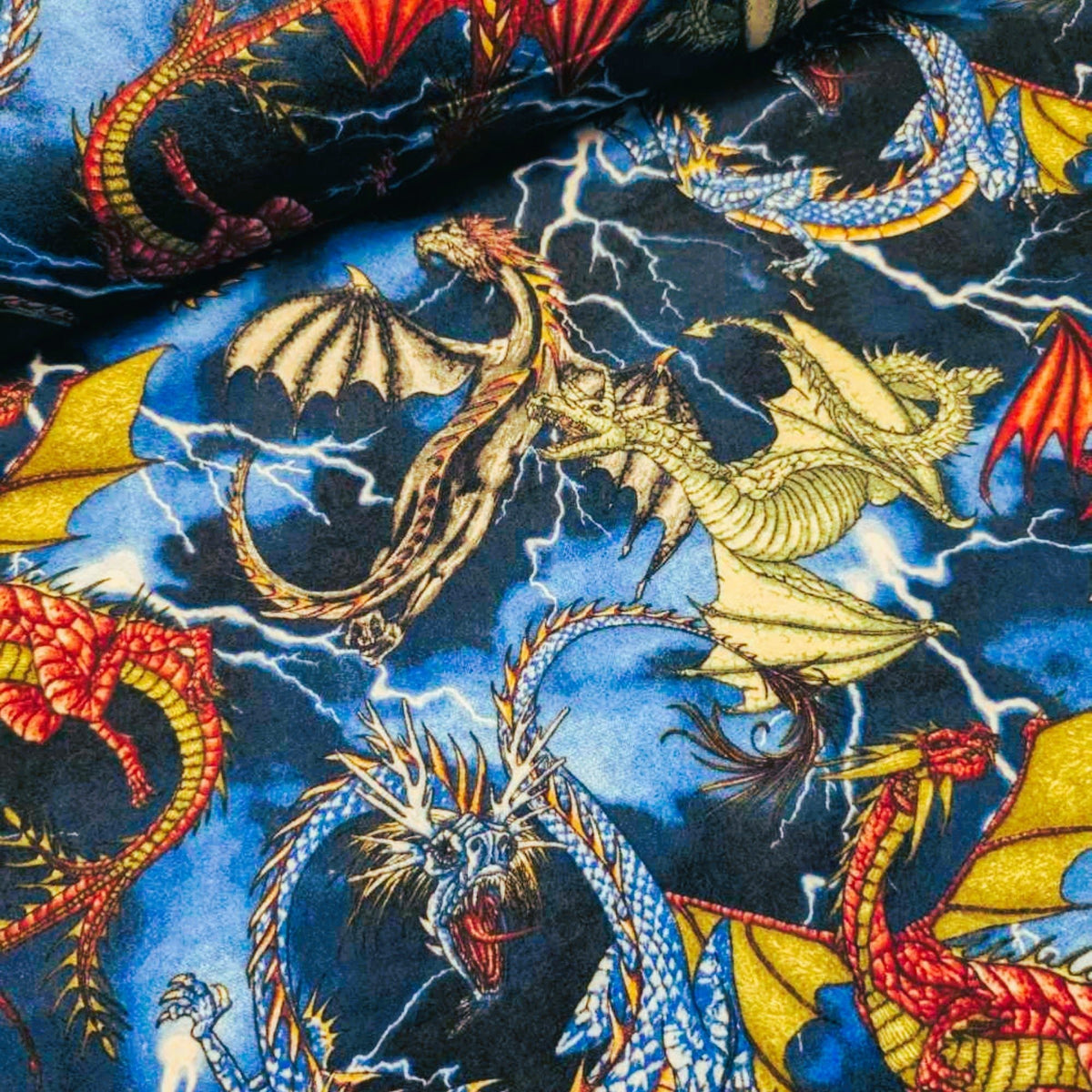 Colorful Dragons Cotton Flannel β Fantasy Creatures on Lightning Sky