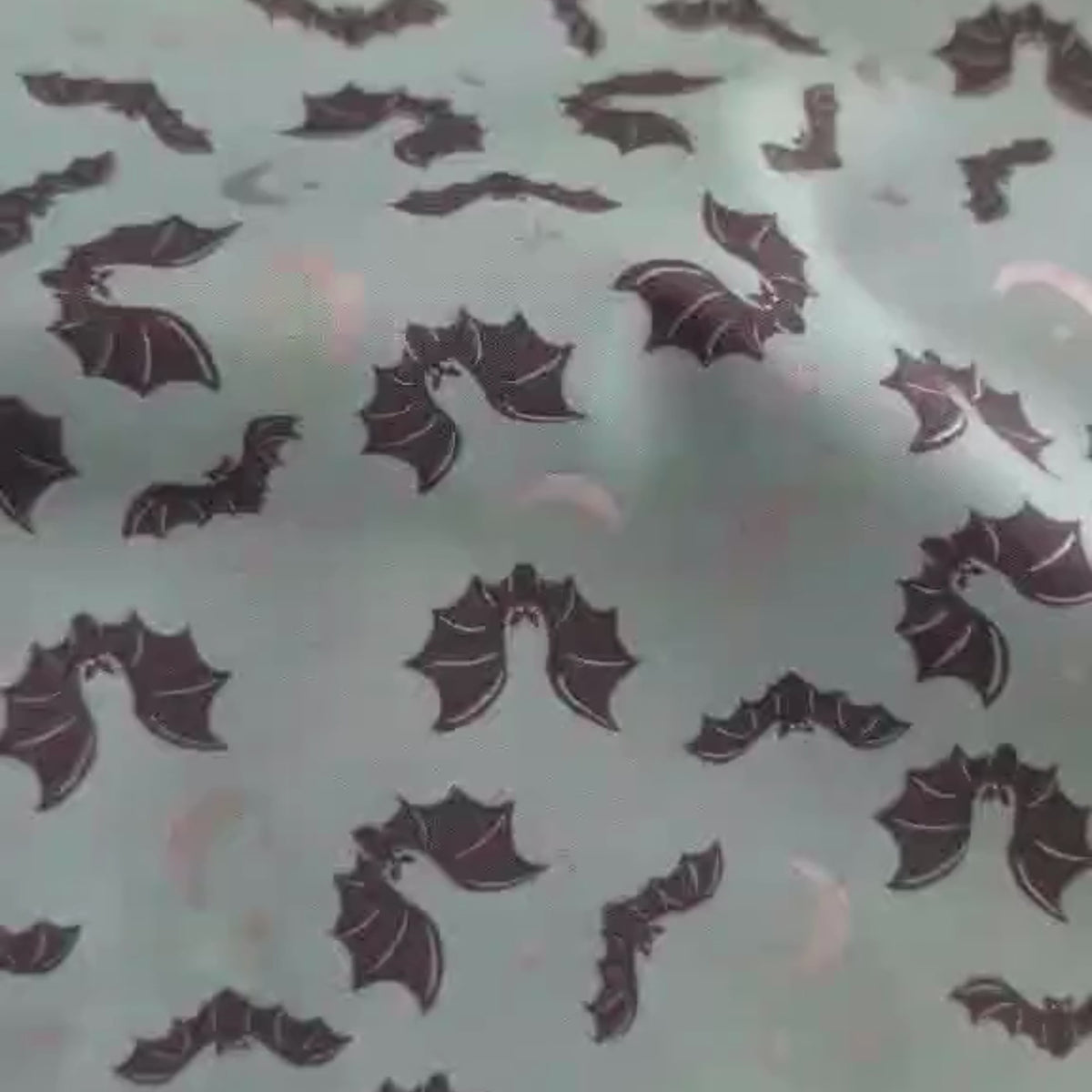 Video of Teal Halloween cotton fabric with flying bats, moons, and stars β Spooky Hollow SC10572 by Riley Blake Designs