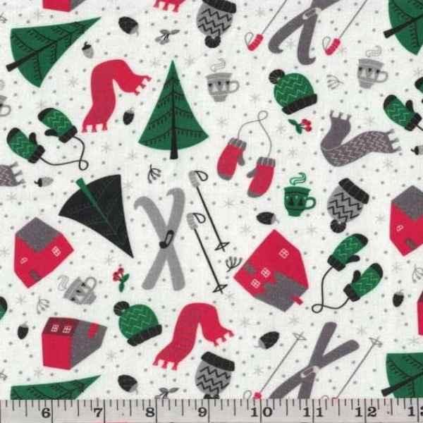 Winter Ski Lodge Toss cotton fabric with cabins, skis, mittens, scarves, hats, cocoa, and trees on snowy white background.