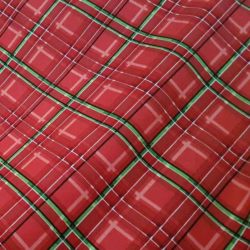 Hi-Fashion Fabrics 7291 – Red and green Christmas plaid cotton fabric with white and black accents.