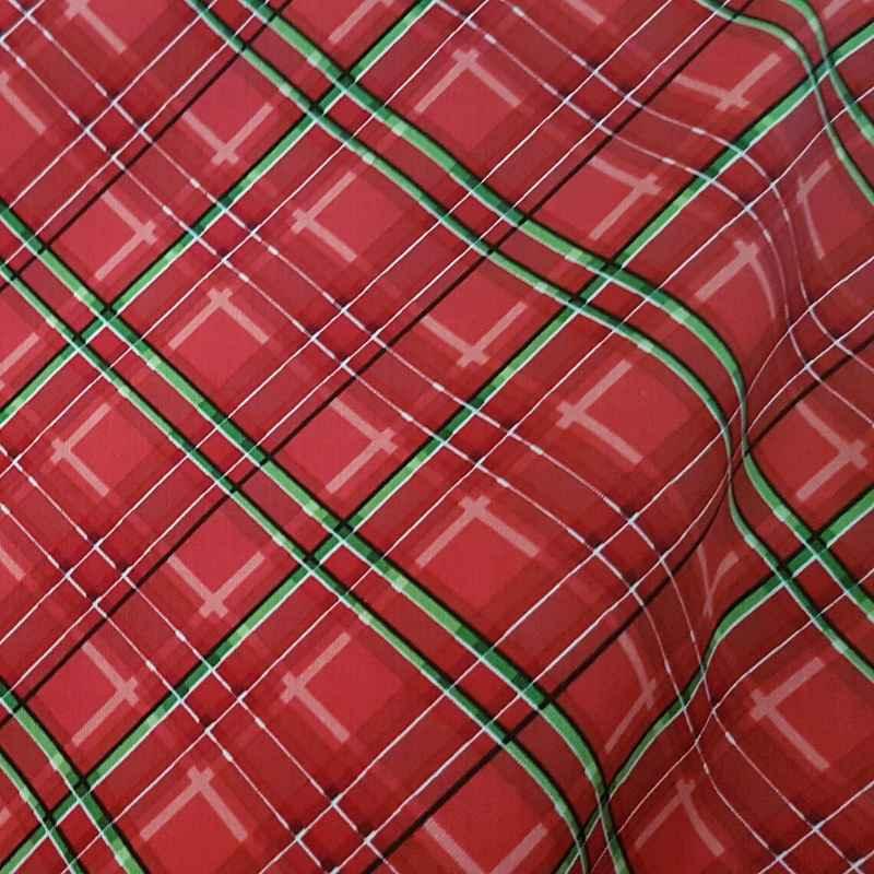Hi-Fashion Fabrics 7291 – Red and green Christmas plaid cotton fabric with white and black accents.