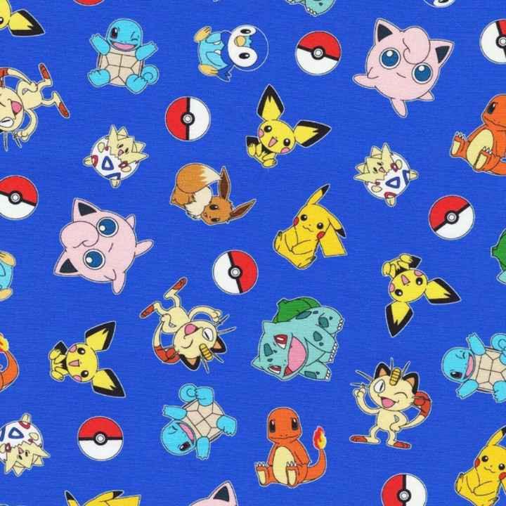 Colorful Pokémon characters including Pikachu, Jigglypuff, and Squirtle tossed on a bright blue cotton fabric with Poké Balls