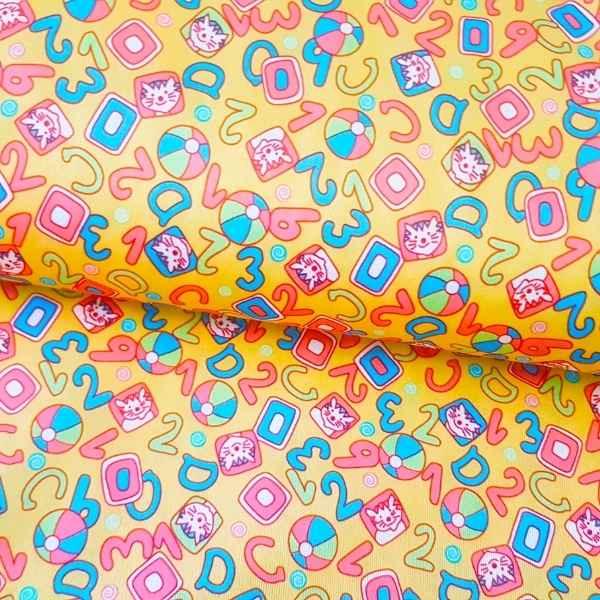 PUL Fabric Numbers Laminated Waterproof Fabric Orange | Fabric Design Treasures