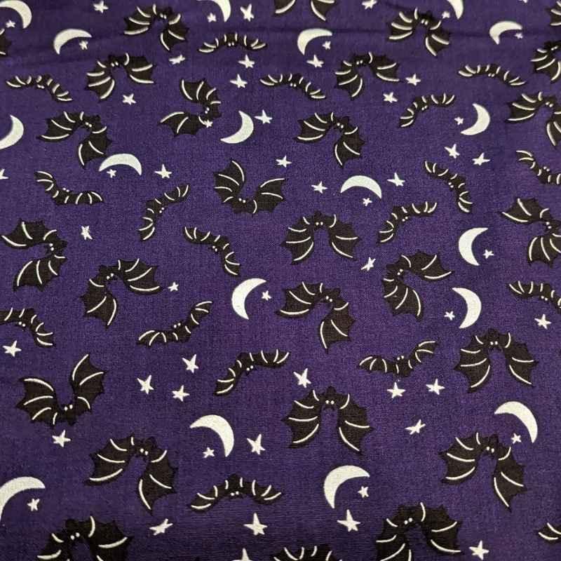 Purple Halloween cotton fabric with black bats, moons, and stars – Spooky Hollow by Riley Blake Designs SC10572