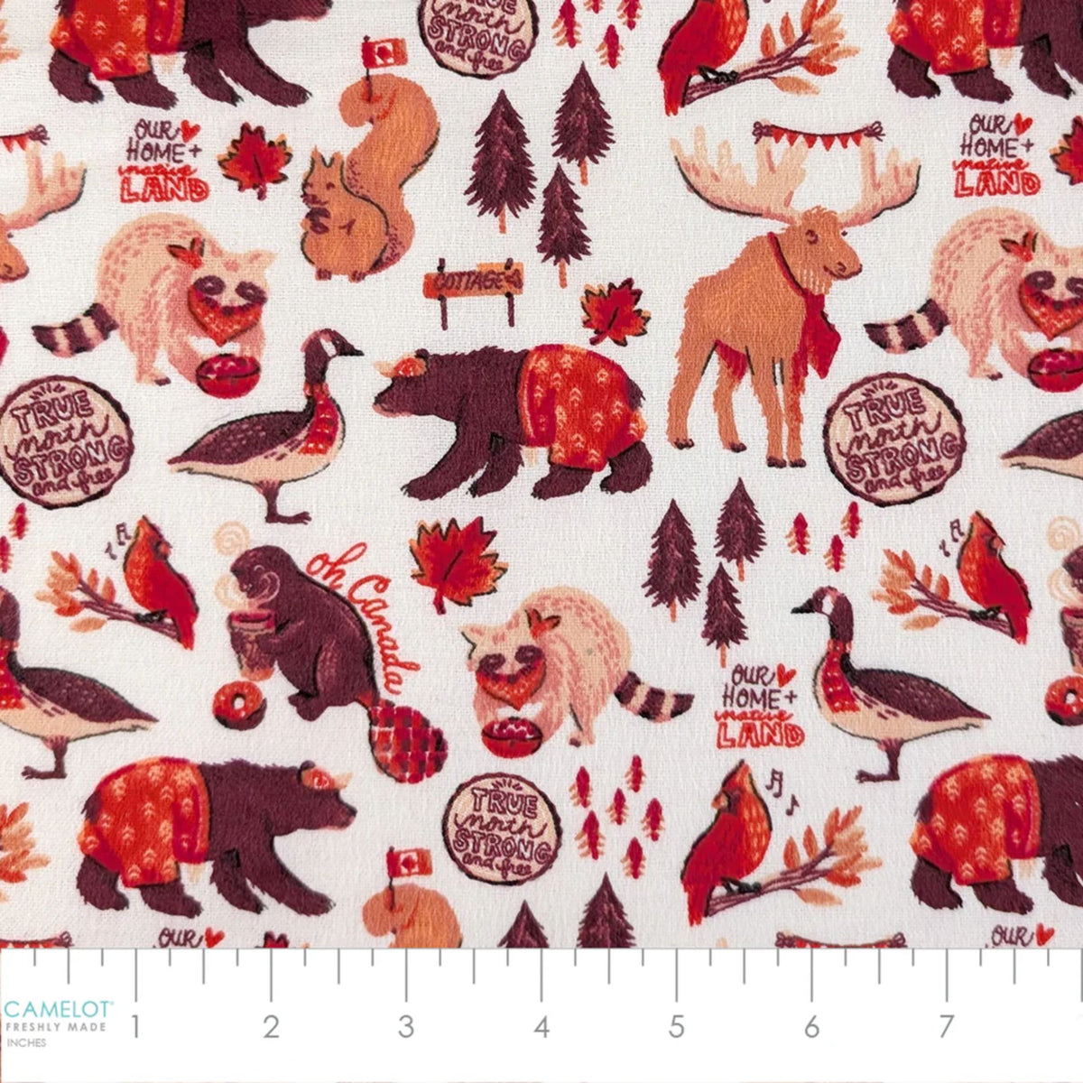 Camelot Fabrics Canadian Animals white cotton flannel fabric featuring bears, moose, beavers, geese, cardinals, and autumn woodland motifs.