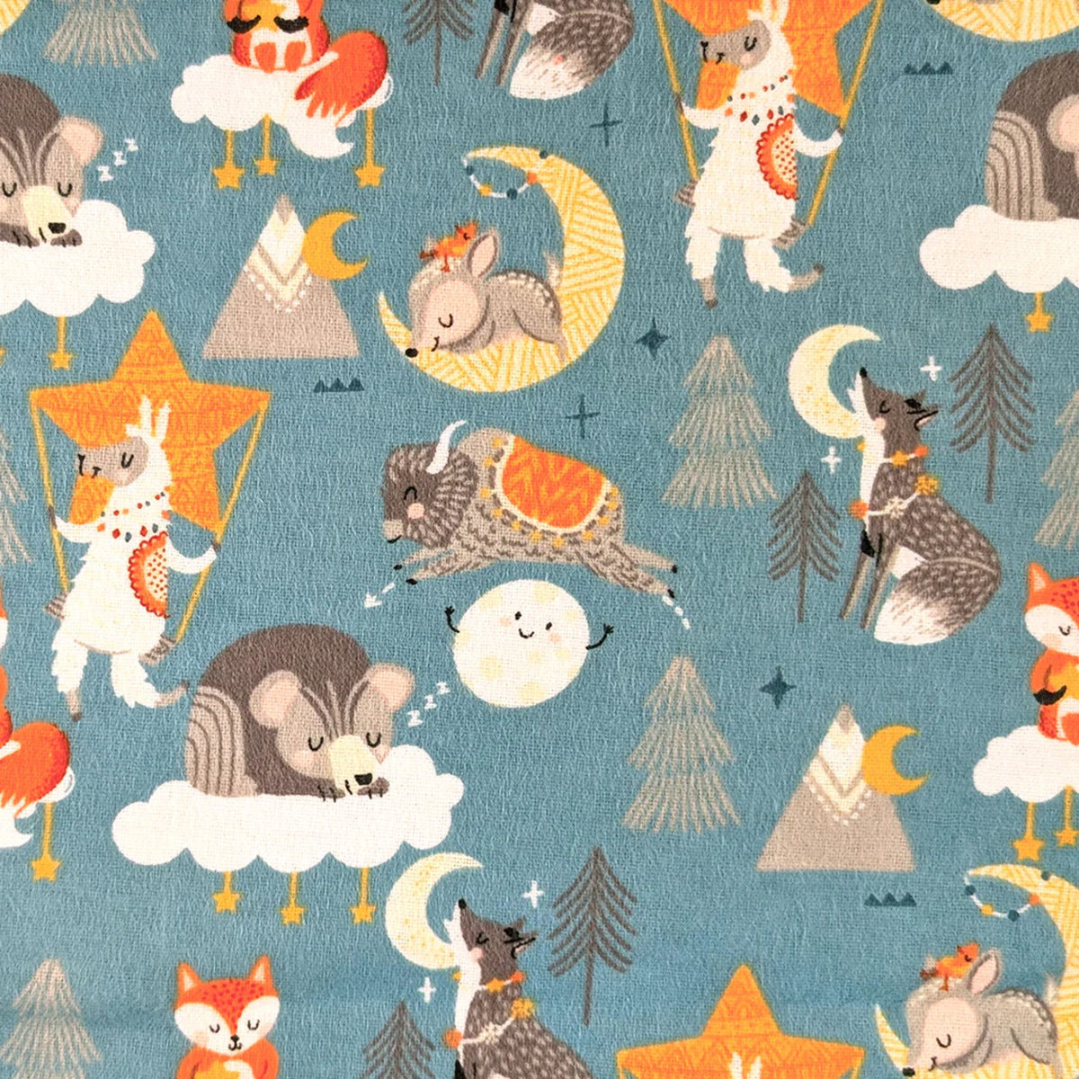 Desert Baby teal cotton flannel fabric featuring foxes, llamas, wolves, rabbits, buffalo, bears, mountains, moons, clouds, and stars.