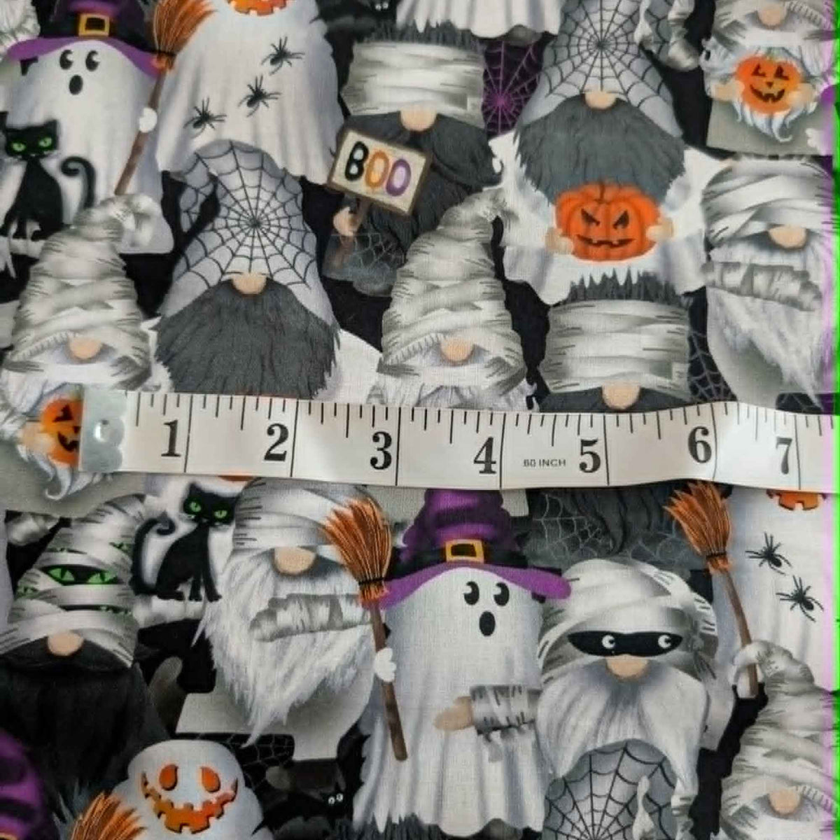 Halloween gnome cotton fabric with ghost mummy and witch gnomes pumpkins black cats spiders and cobwebs by Timeless Treasures