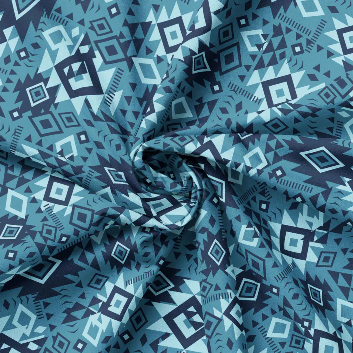 “Denim blue Southwestern geometric cotton fabric with layered Aztec diamond motifs.”