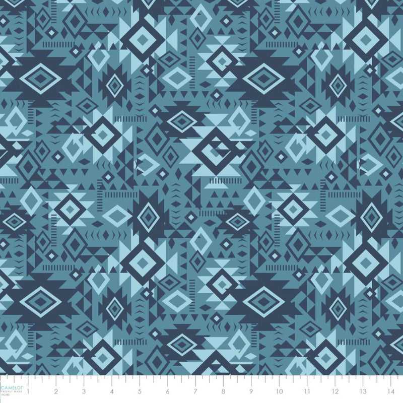 “Denim blue Southwestern geometric cotton fabric with layered Aztec diamond motifs.”
