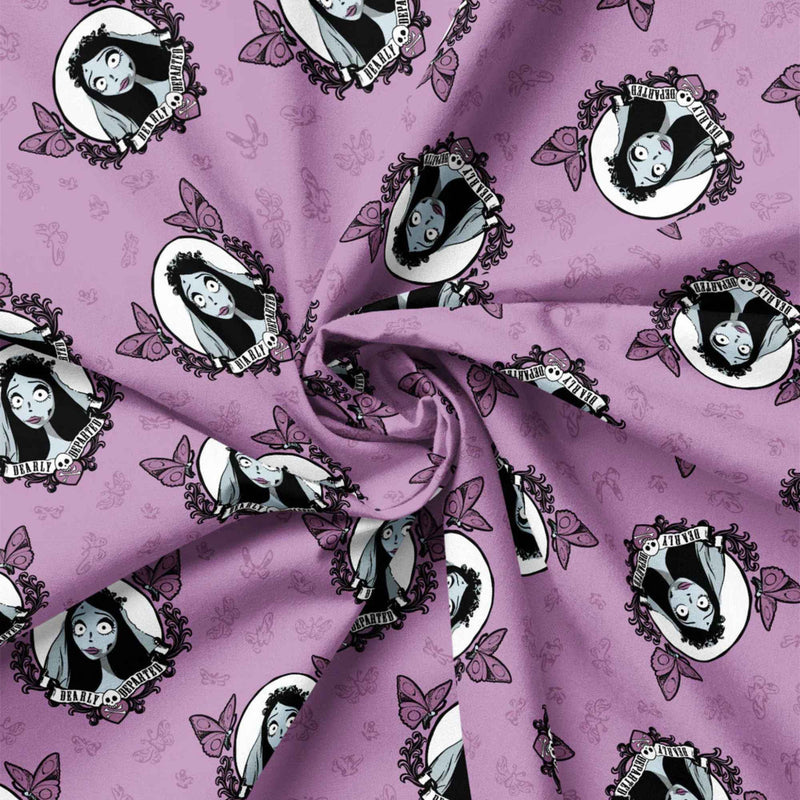 Corpse Bride mauve cotton fabric featuring Emily portraits framed with butterflies and gothic floral motifs in a repeating pattern.