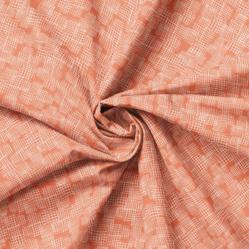 "Etches coral cotton fabric with white abstract crosshatch textured design by Camelot Fabrics"