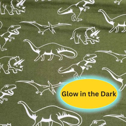 Glow in the dark dinosaur cotton flannel fabric with white dinosaur silhouettes on dark background, soft brushed quilting fabric