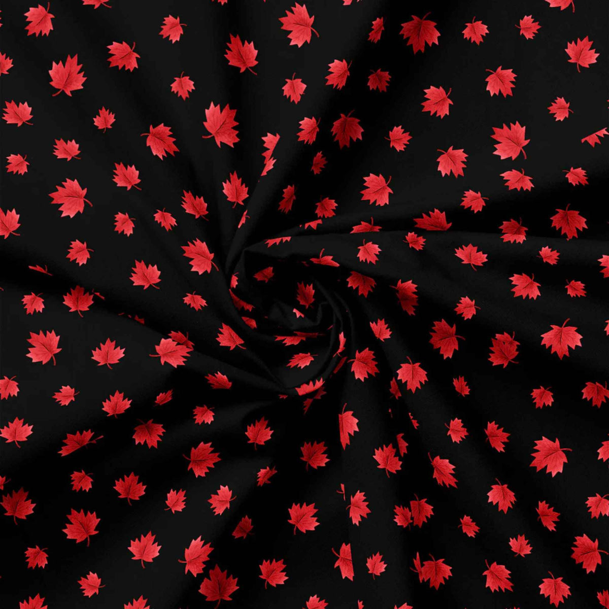 "Black cotton fabric with scattered red maple leaf pattern from Camelot Fabrics"