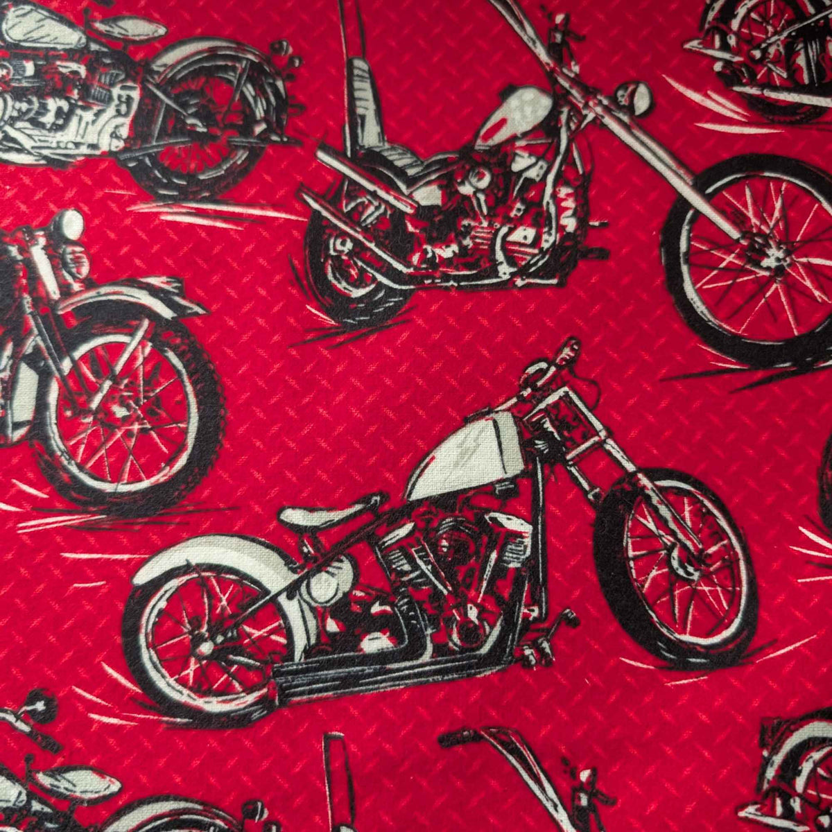Red cotton flannel fabric with black and grey motorcycle print, brushed soft, OEKO-TEX certified, 44 inches wide.