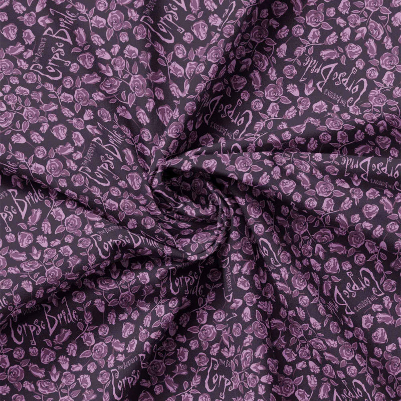Purple Corpse Bride cotton fabric with lavender roses and gothic motifs repeating across the design.
