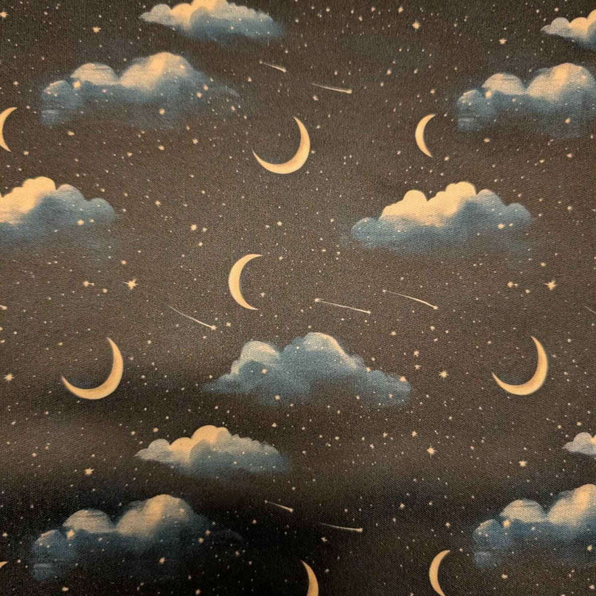 Moonlit Clouds and Shooting Stars exclusive waterproof PUL fabric with golden crescent moons, blue clouds and stars on black