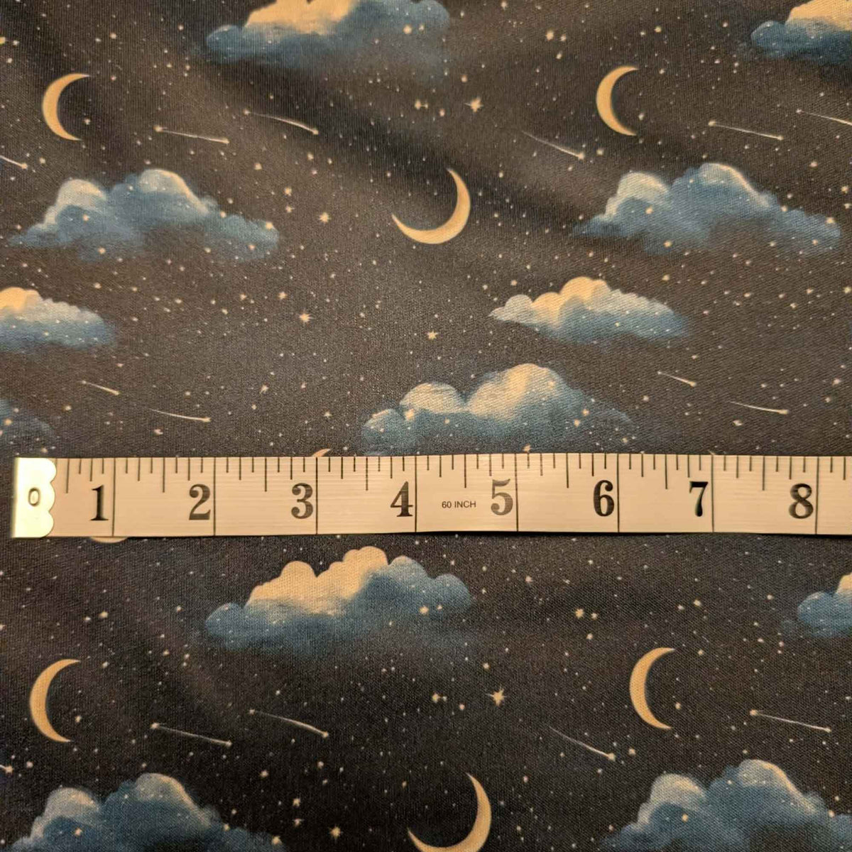 Moonlit Clouds and Shooting Stars exclusive waterproof PUL fabric with golden crescent moons, blue clouds and stars on black