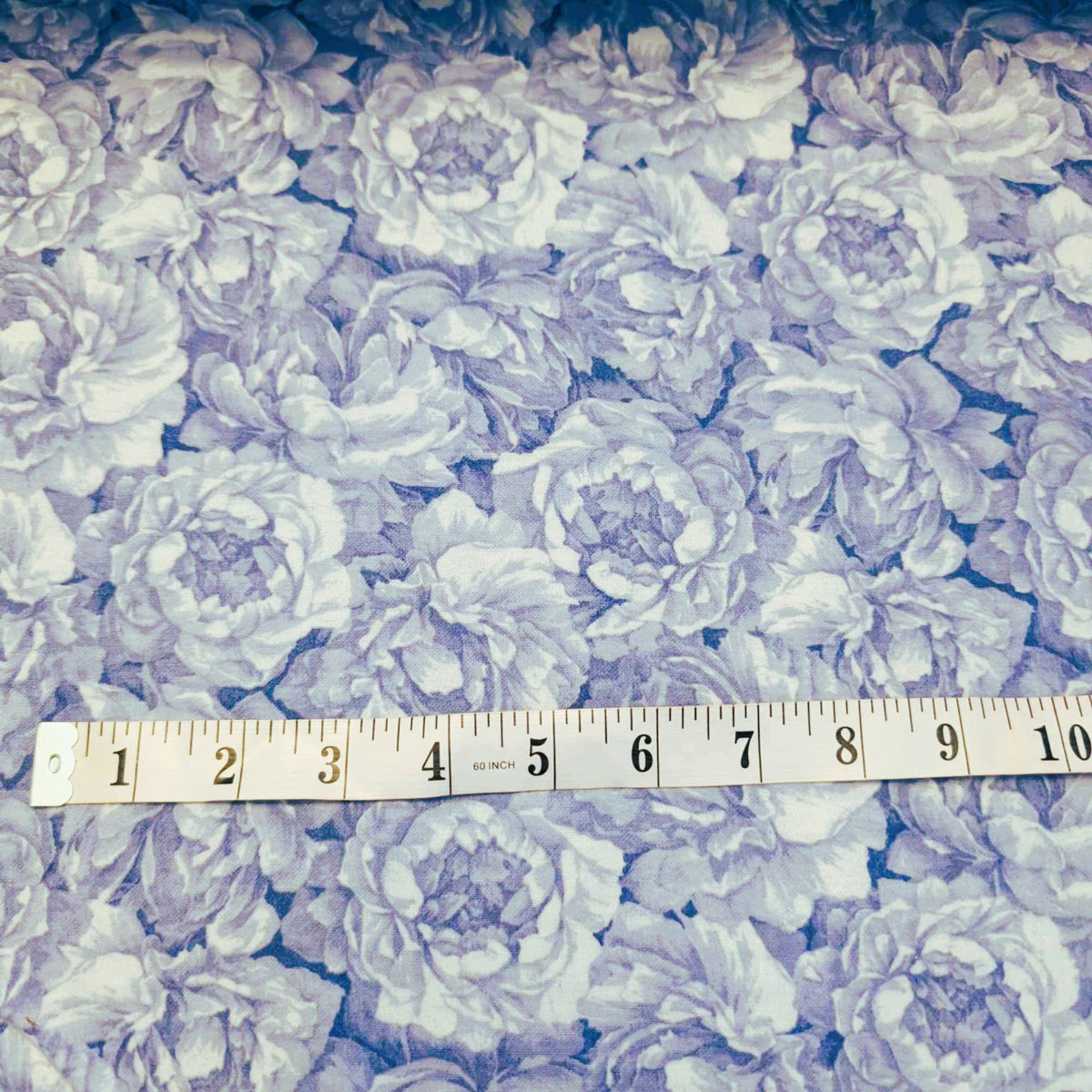 108 inch wide brushed cotton flannel wideback with blue floral print for seamless quilt backing