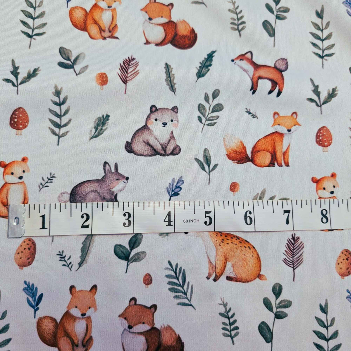Woodland animals PUL fabric showing print scale waterproof sewing fabric