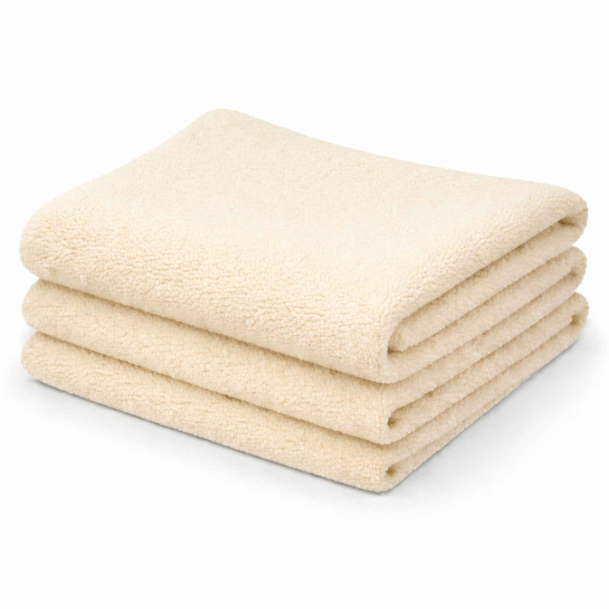 Cream anti-pill polar fleece fabric folded stack soft polyester fleece by Camelot Fabrics