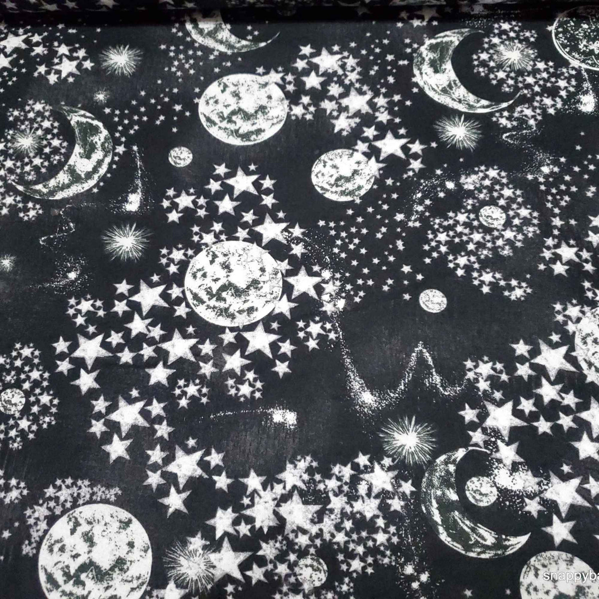 Constellation cotton flannel fabric with moon and stars pattern on dark background, soft brushed quilting fabric