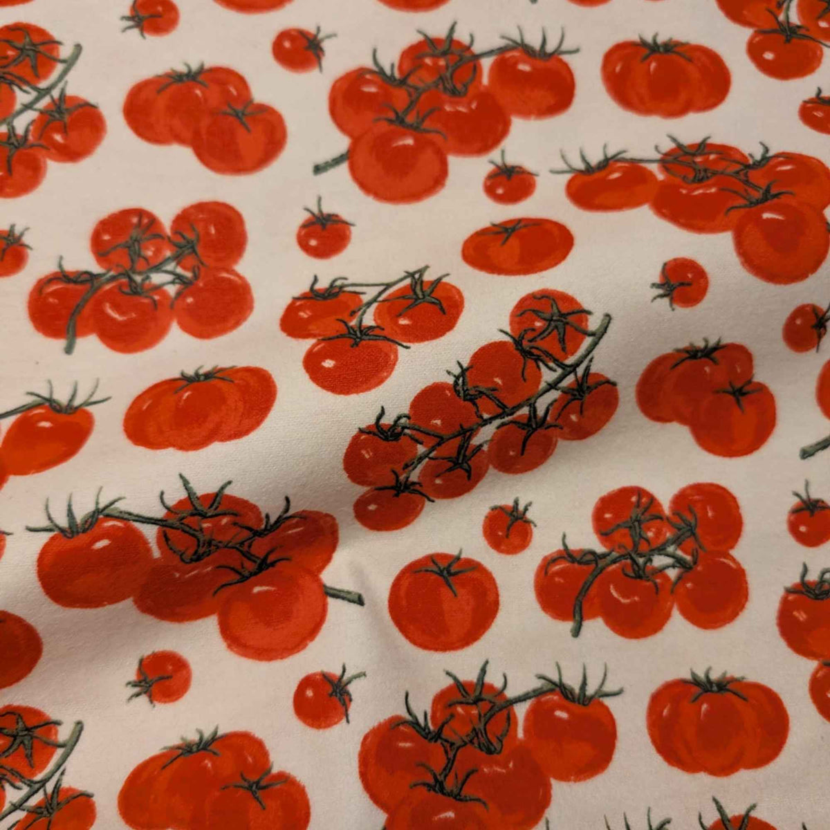 Cherry tomato cotton flannel fabric with red tomato clusters on light background, soft brushed novelty quilting fabric