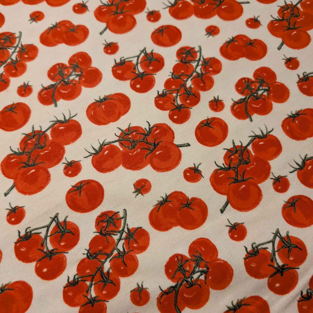Cherry tomato cotton flannel fabric with red tomato clusters on light background, soft brushed novelty quilting fabric