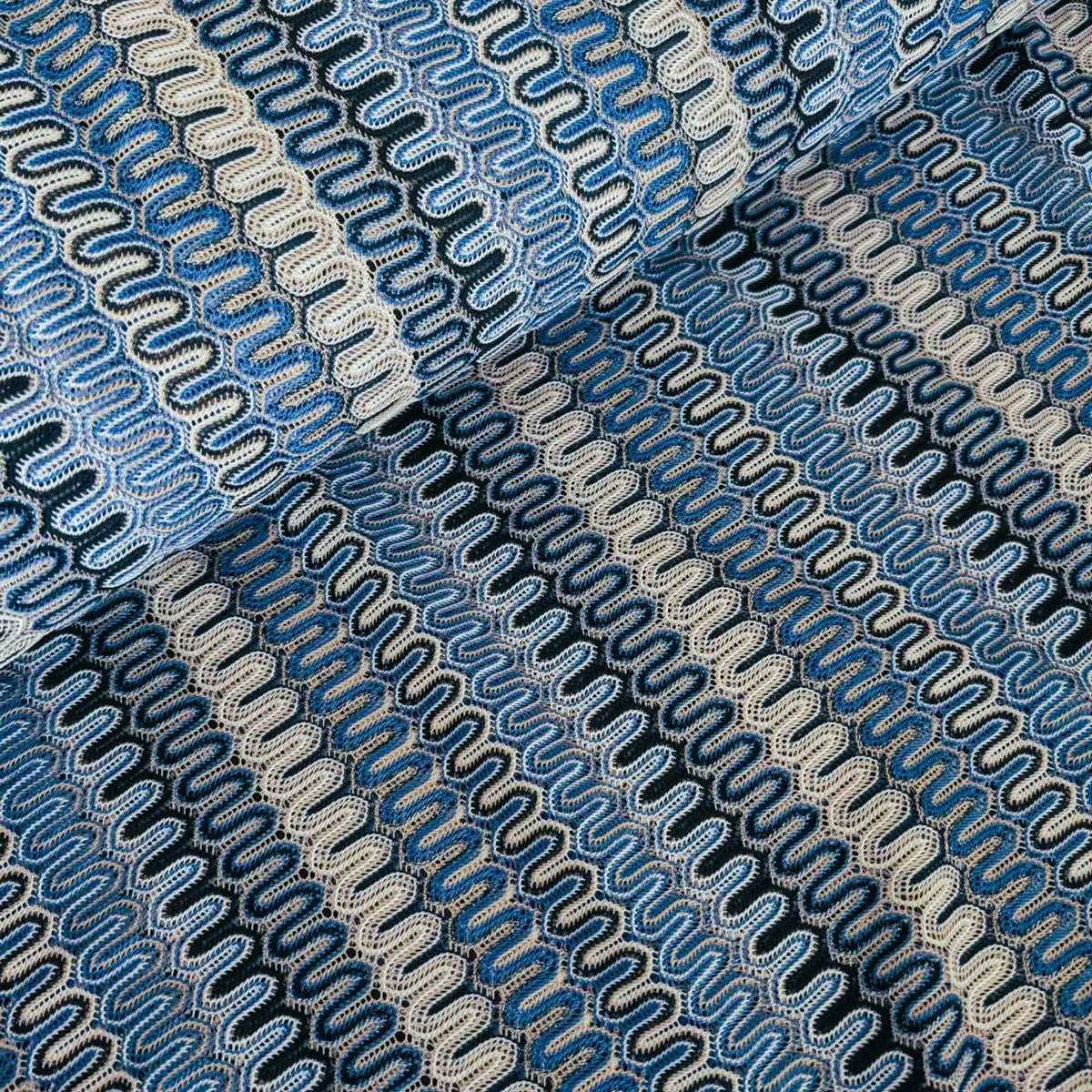 Missoni style blue zigzag wave 4-way stretch jersey knit fabric in polyester elastane lightweight textile close-up