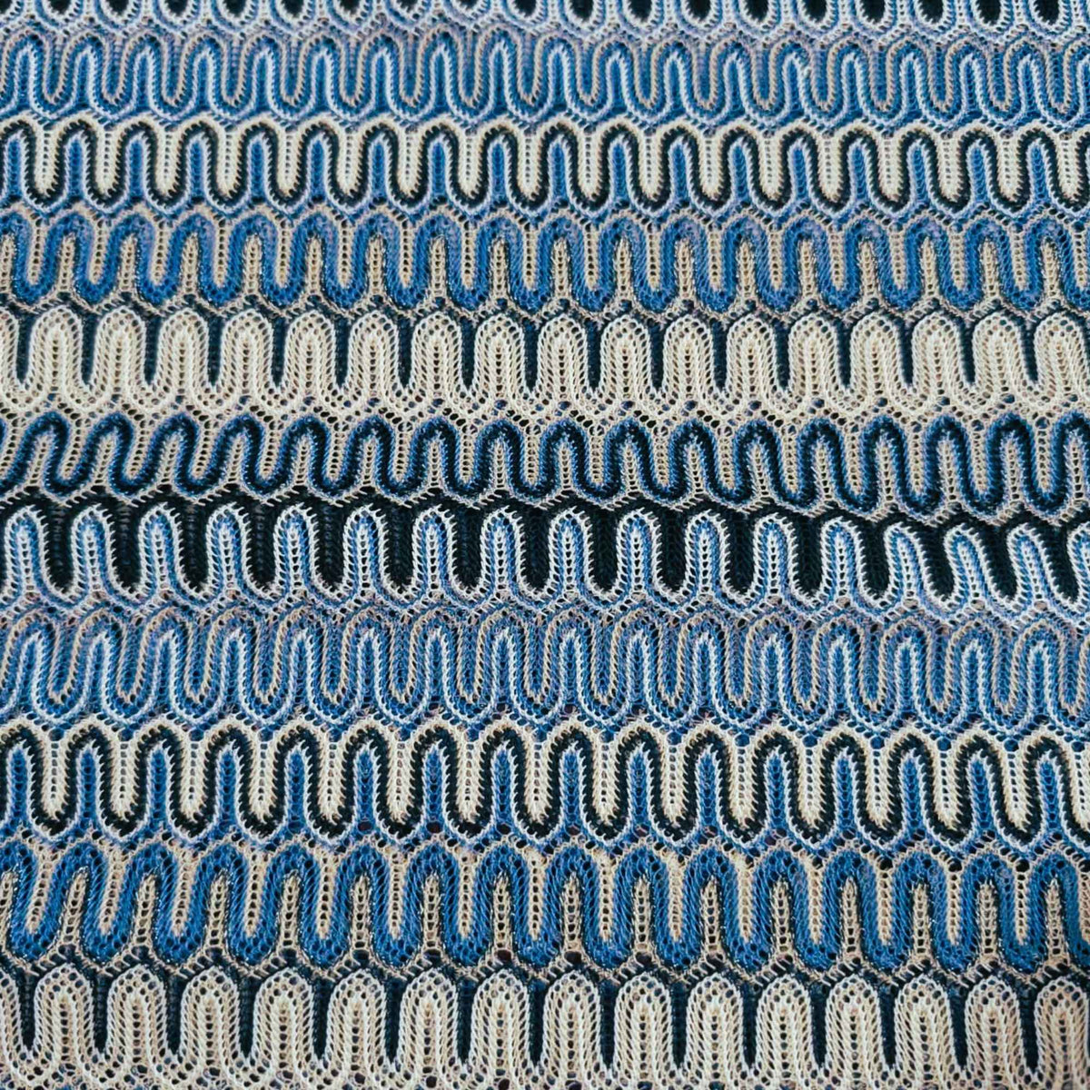 Missoni style blue zigzag wave 4-way stretch jersey knit fabric in polyester elastane lightweight textile close-up