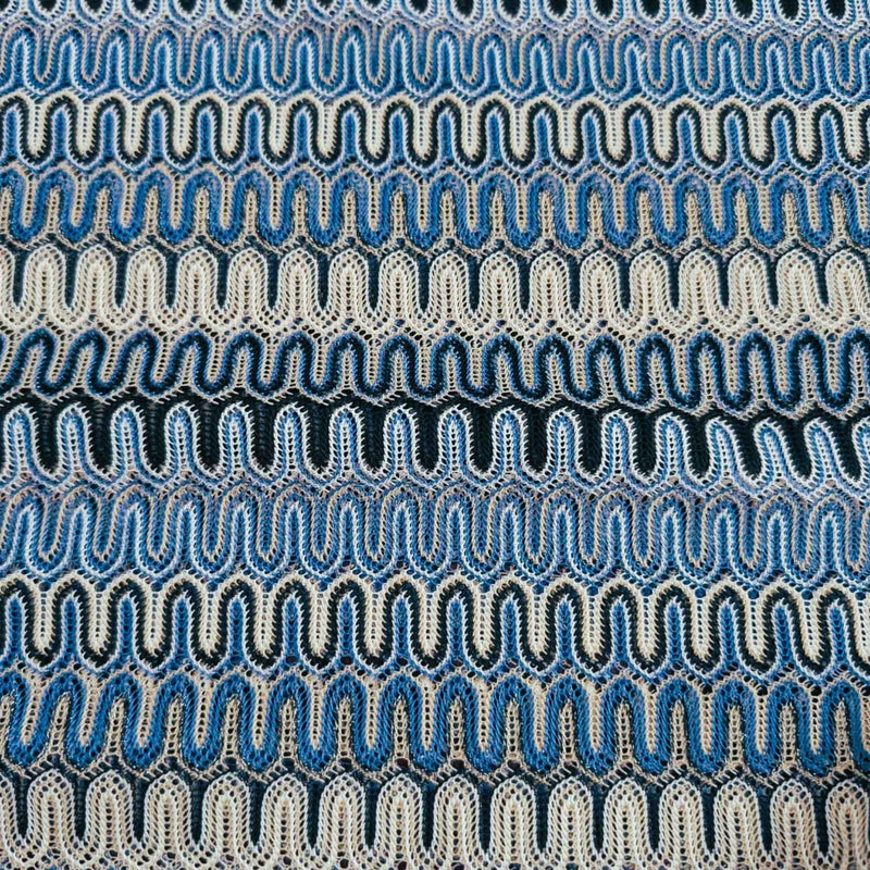 Missoni style blue zigzag wave 4-way stretch jersey knit fabric in polyester elastane lightweight textile close-up