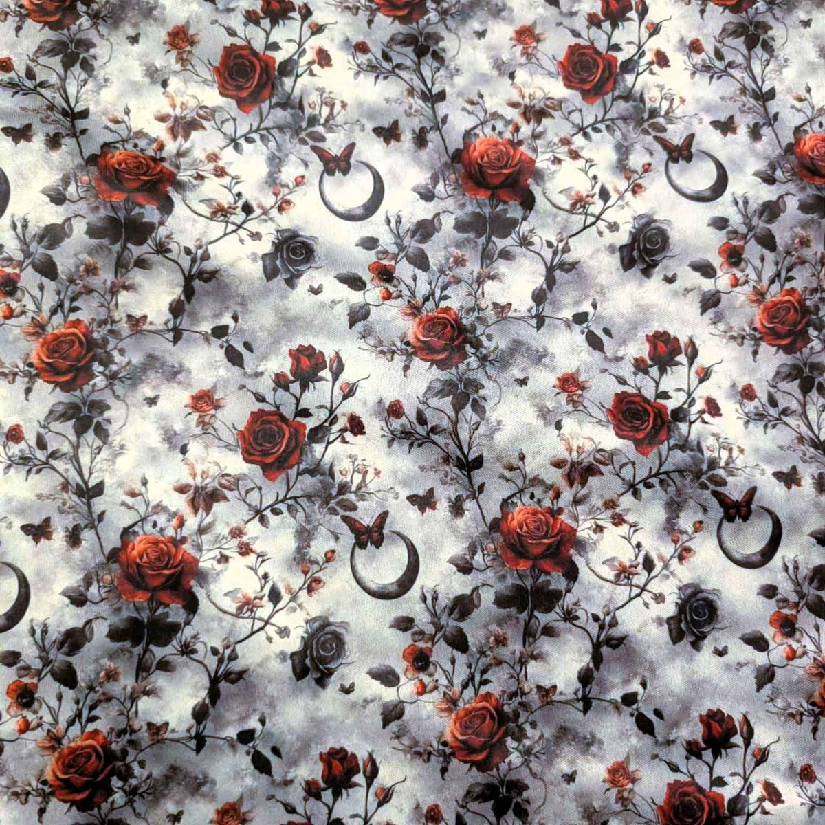 Enchanted Moonlit Roses exclusive waterproof PUL fabric with red and black roses, butterflies and crescent moons on a smoky cream background