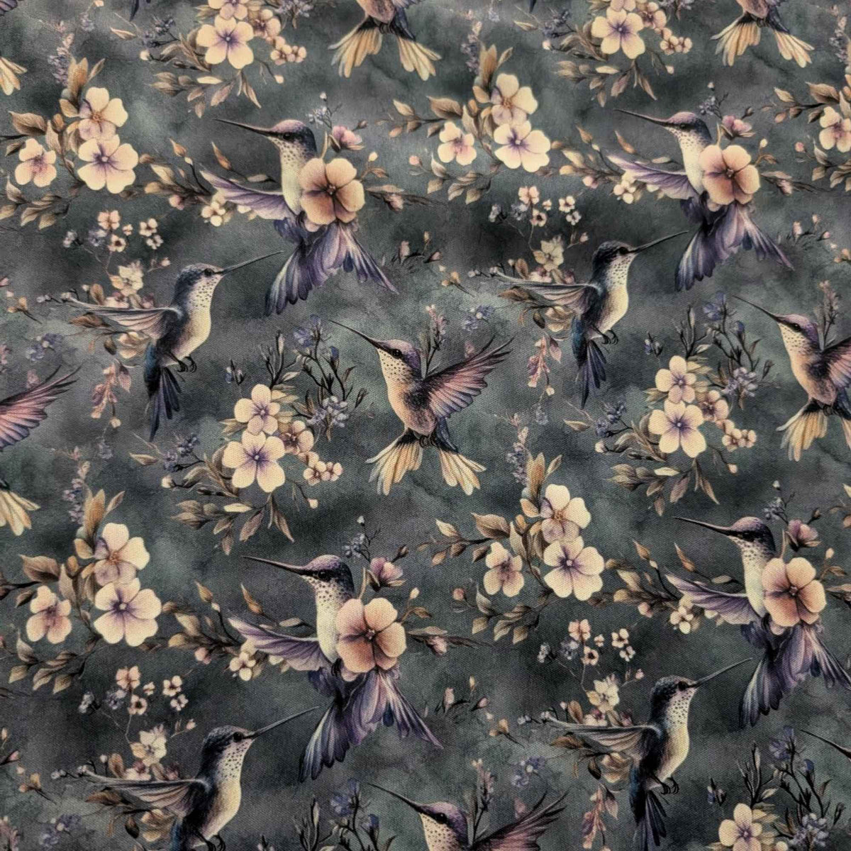 Twilight Hummingbird Garden exclusive waterproof PUL fabric with hummingbirds and soft flowers on a smoky blue-grey background