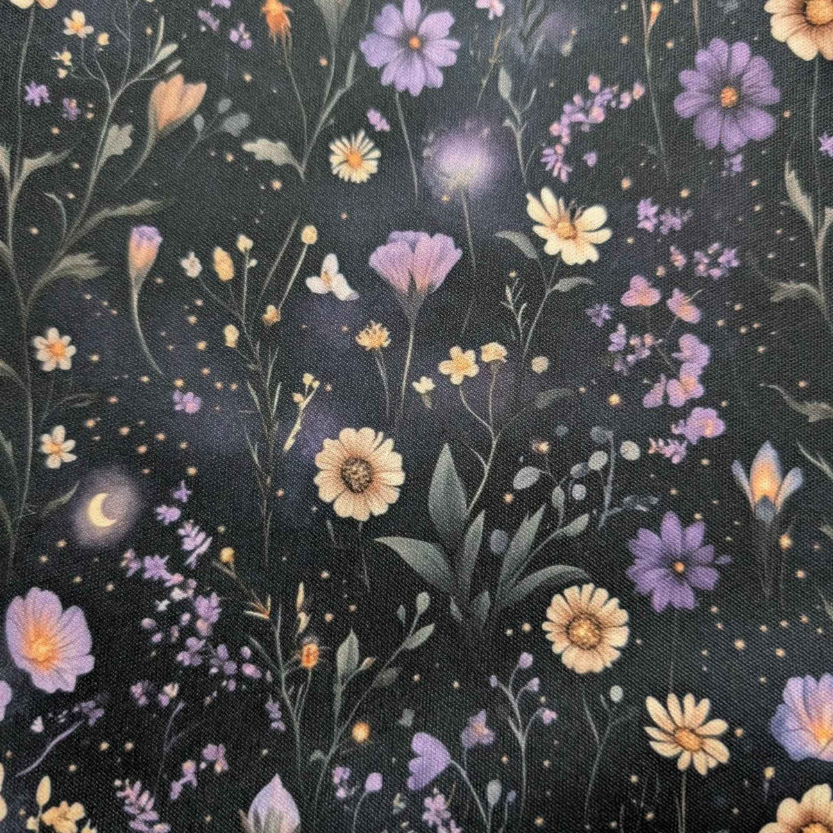Starlit Wildflower Meadow exclusive waterproof PUL fabric with purple and golden flowers, crescent moons and glowing stars on black