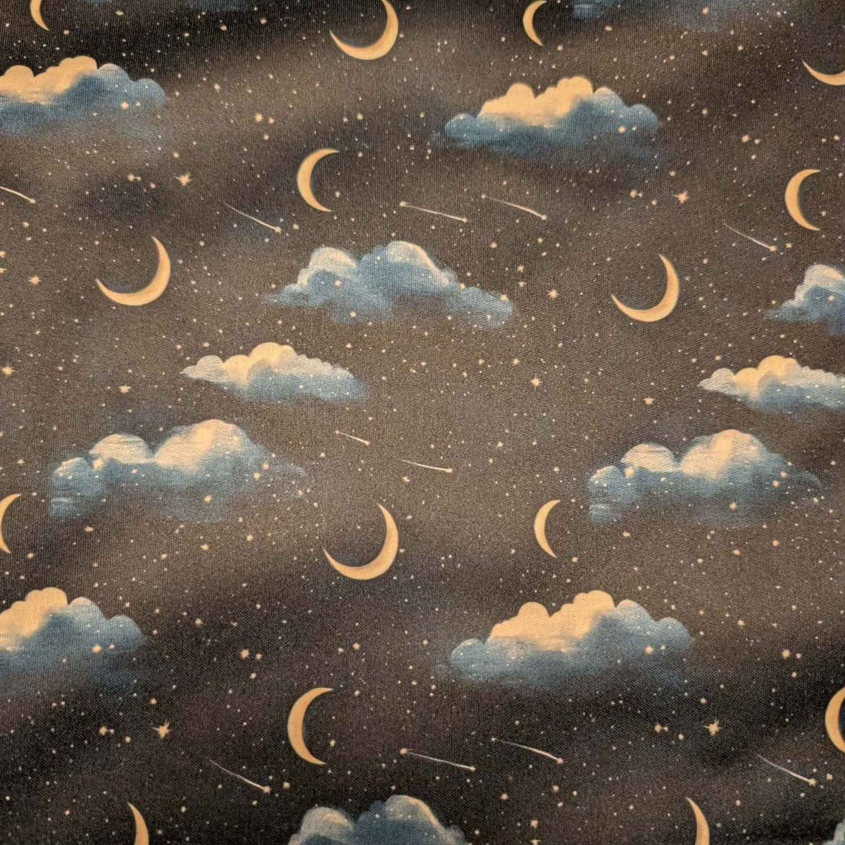 Moonlit Clouds and Shooting Stars exclusive waterproof PUL fabric with golden crescent moons, blue clouds and stars on black