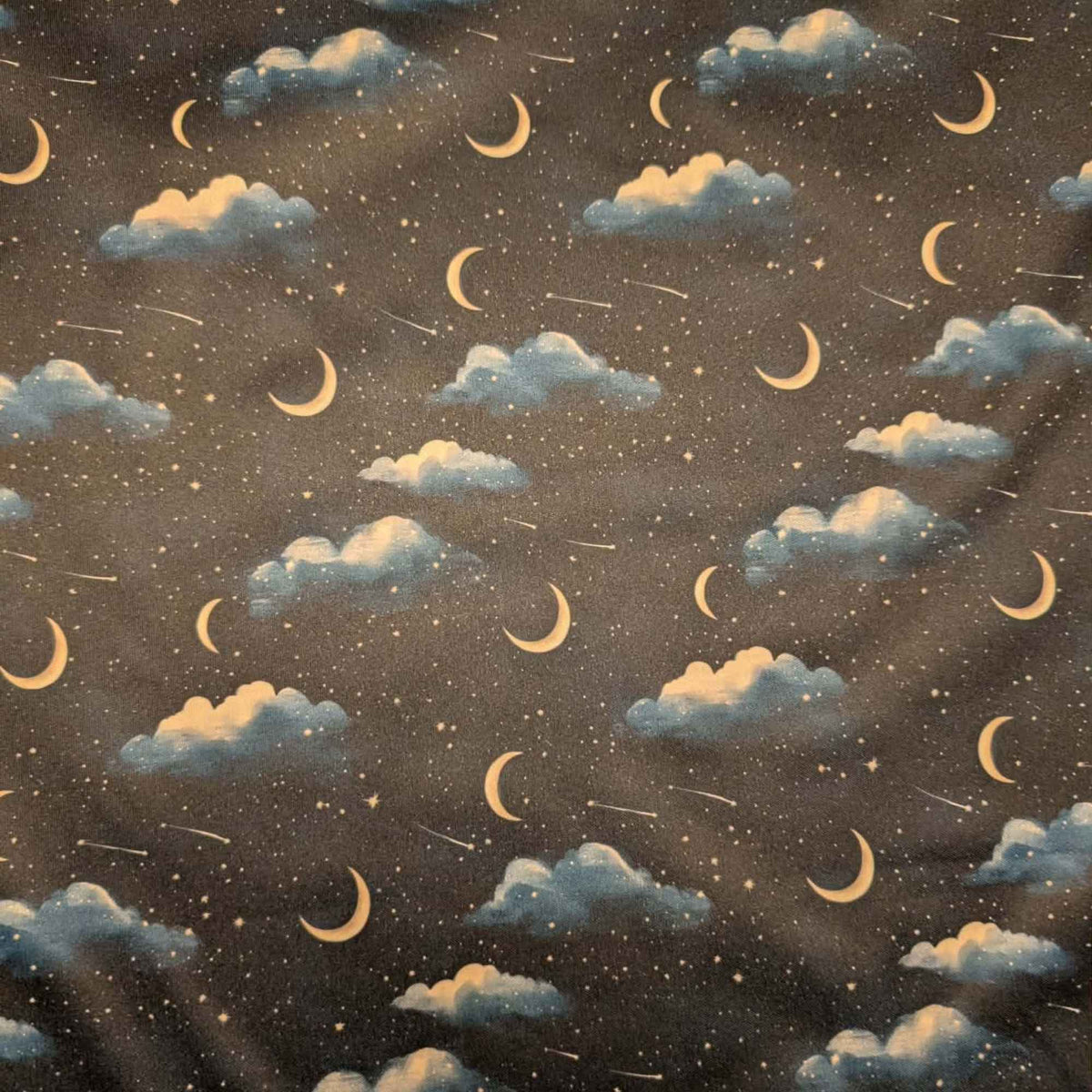 Moonlit Clouds and Shooting Stars exclusive waterproof PUL fabric with golden crescent moons, blue clouds and stars on black