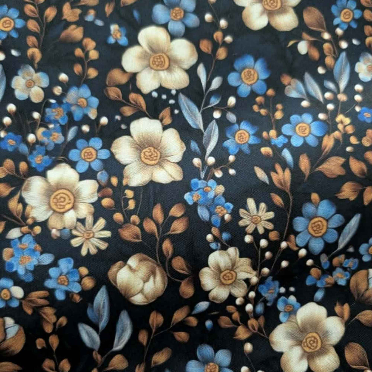 Midnight Blue Botanical Garden exclusive waterproof PUL fabric with blue and ivory flowers and bronze leaves on a dark background