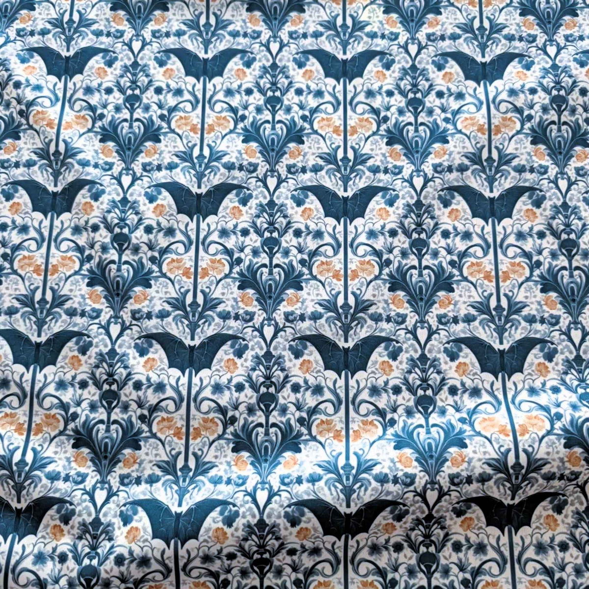 Midnight Bats Art Nouveau Garden exclusive waterproof PUL fabric with blue bats, stylized flowers and ornate foliage on ivory