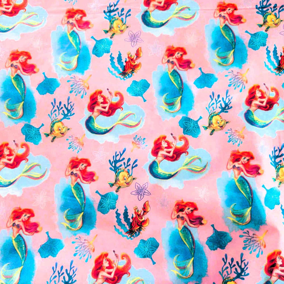 Disney Ariel Little Mermaid cotton fabric with Flounder and Sebastian on pink by Springs Creative CP80606