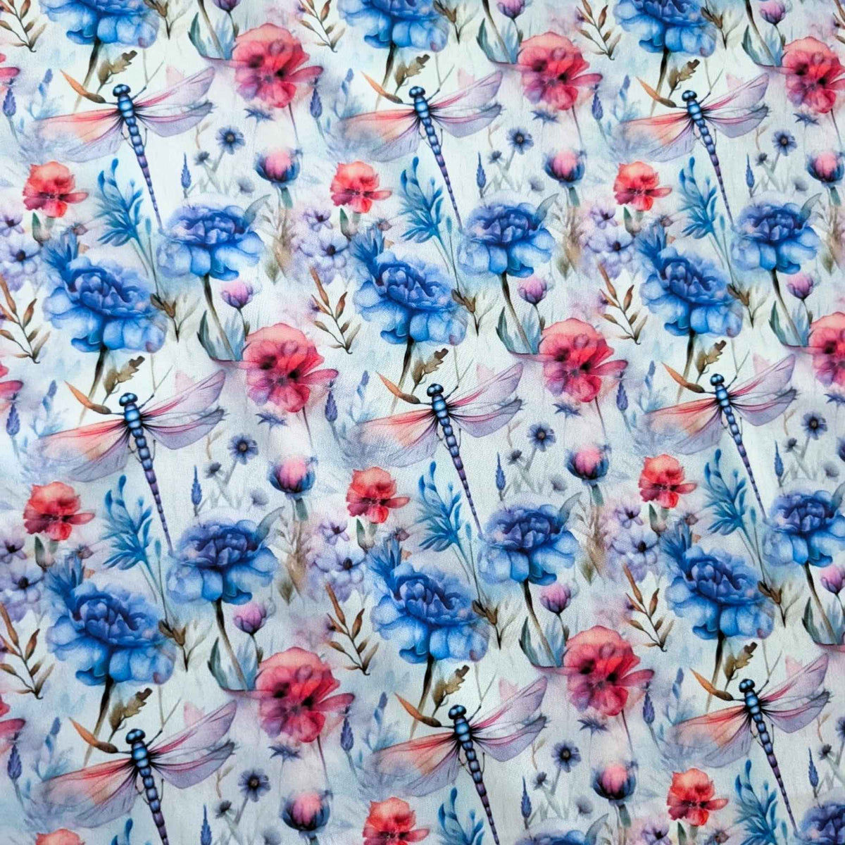 Watercolour Dragonfly Garden exclusive waterproof PUL fabric with blue dragonflies and blue, coral and lavender flowers on white