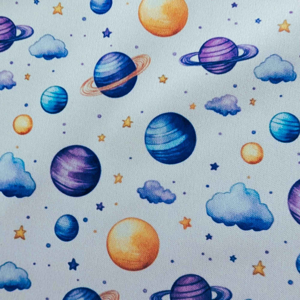 Dreamy Watercolour Planets and Clouds exclusive waterproof PUL fabric with colourful planets, blue clouds and stars on White