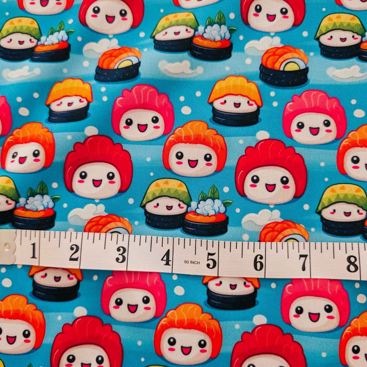Kawaii Happy Sushi exclusive waterproof PUL fabric with smiling colourful sushi characters and white clouds on an aqua-blue background