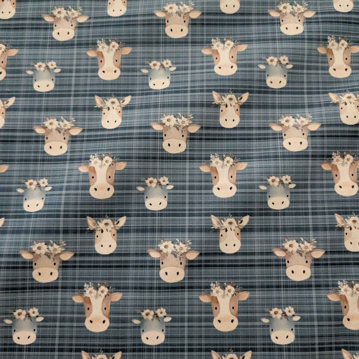 Flower Crown Cows on Blue Plaid exclusive waterproof PUL fabric with brown and grey cows wearing white flowers
