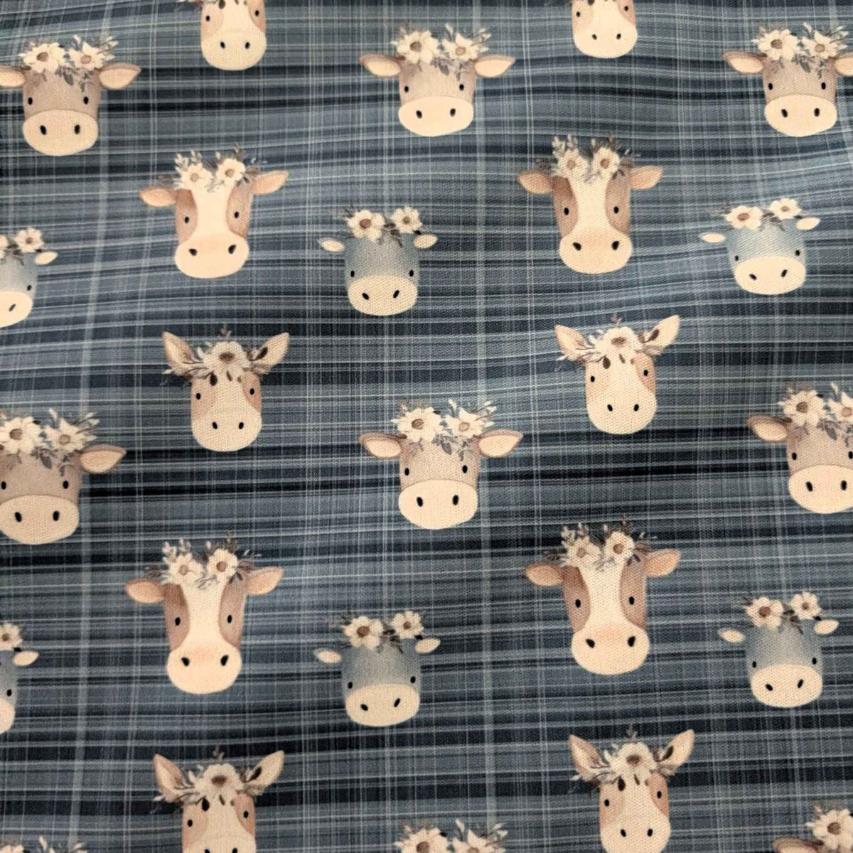 Flower Crown Cows on Blue Plaid exclusive waterproof PUL fabric with brown and grey cows wearing white flowers