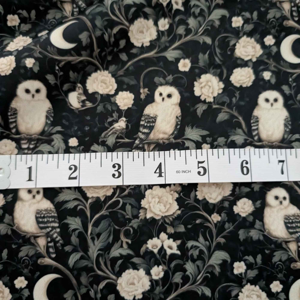 Moonlit Owl Garden exclusive waterproof PUL fabric with ivory owls, cream roses and crescent moons on a dark botanical background