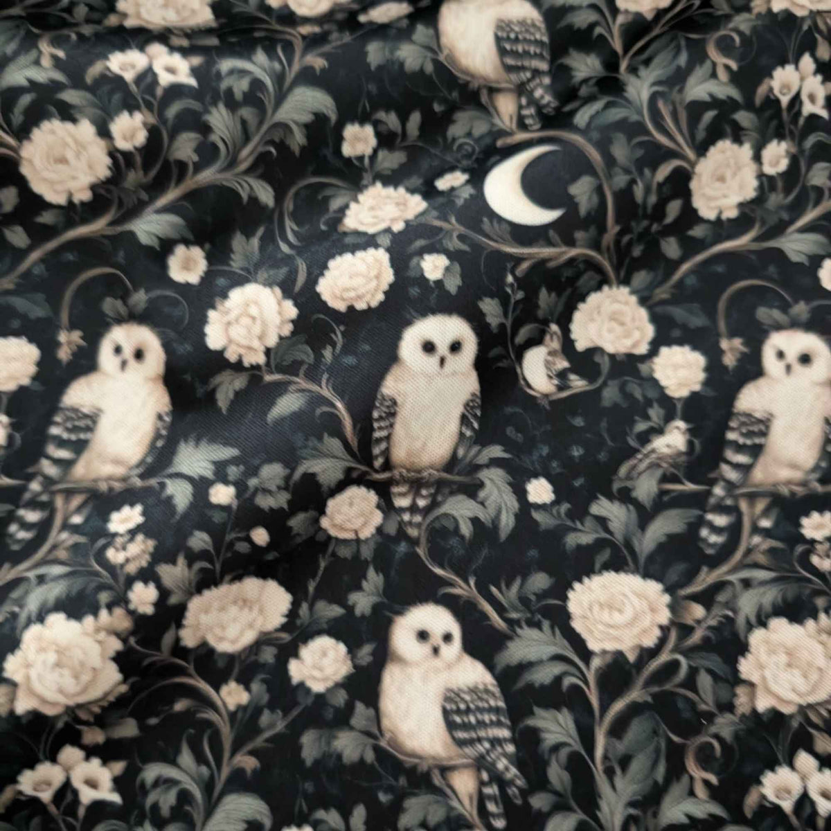 Moonlit Owl Garden exclusive waterproof PUL fabric with ivory owls, cream roses and crescent moons on a dark botanical background