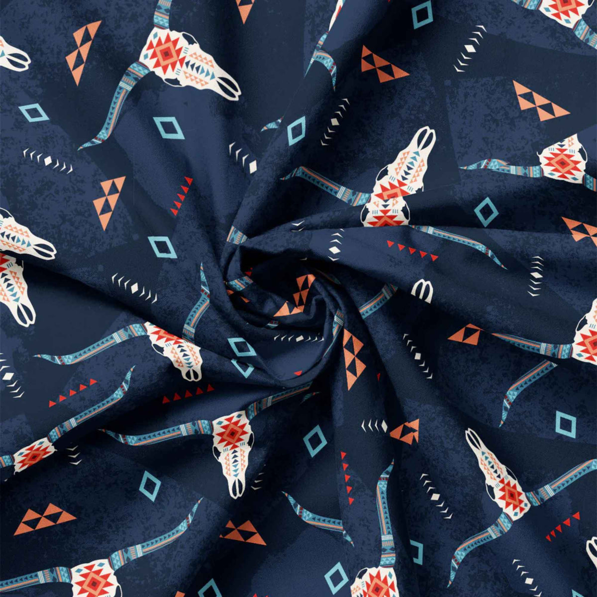 “Navy cotton fabric featuring stylized longhorn skulls with tribal geometric accents and Southwestern motifs.”