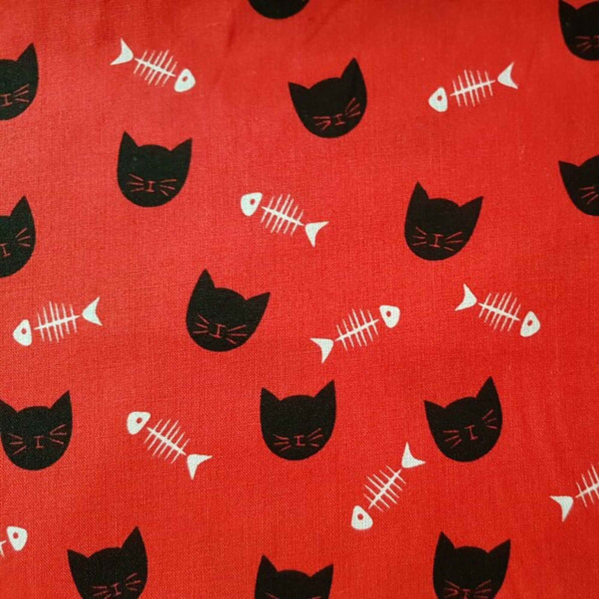 Black Cat Faces & White Fishbones on Red Cotton Fabric