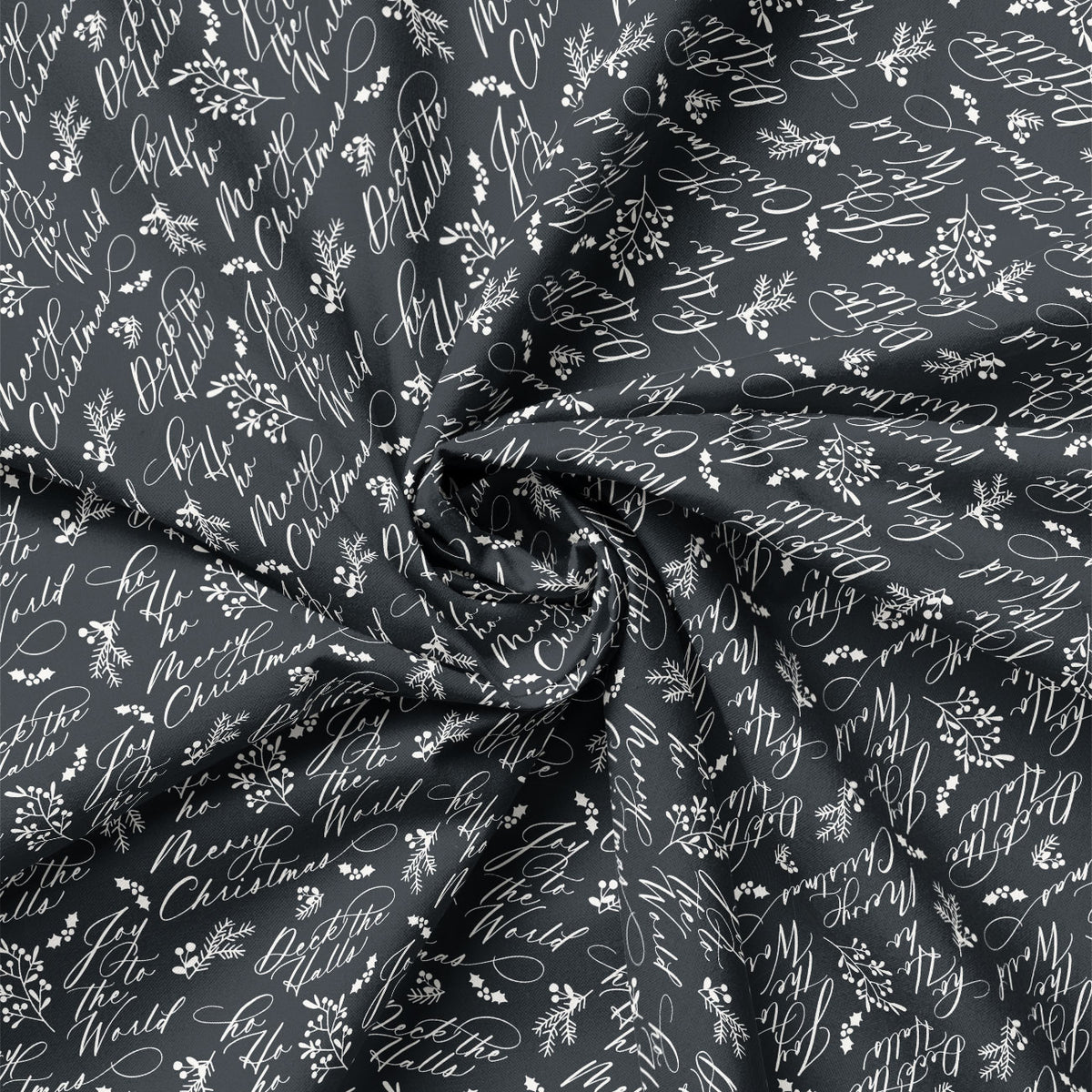 Detail view of Joy to the World Christmas Script on Charcoal quilting cotton showing print scale and drape.