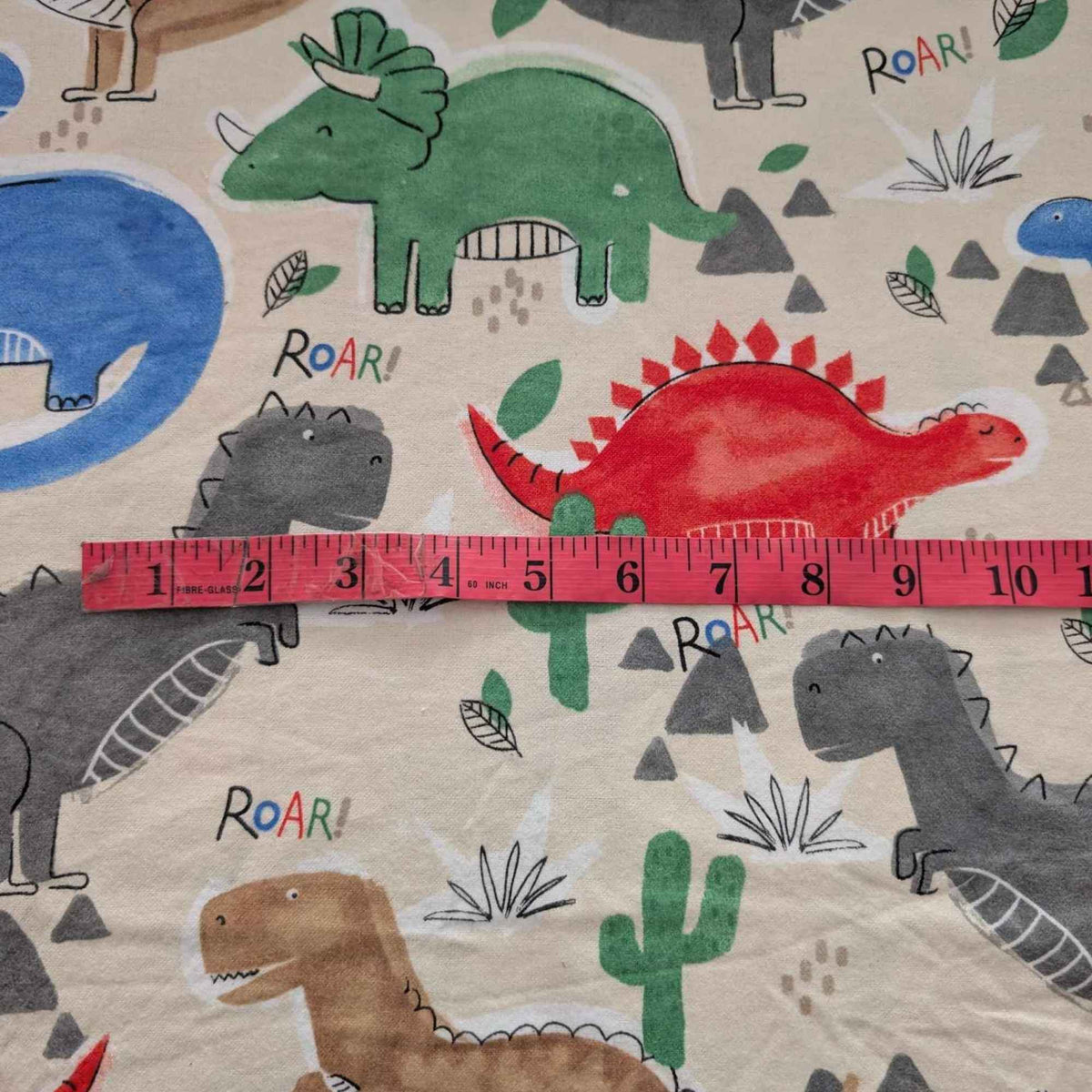 Large Dinosaurs Cotton Flannel – Multicolor Dino Print on Beige – Roar! Kids Fabric
