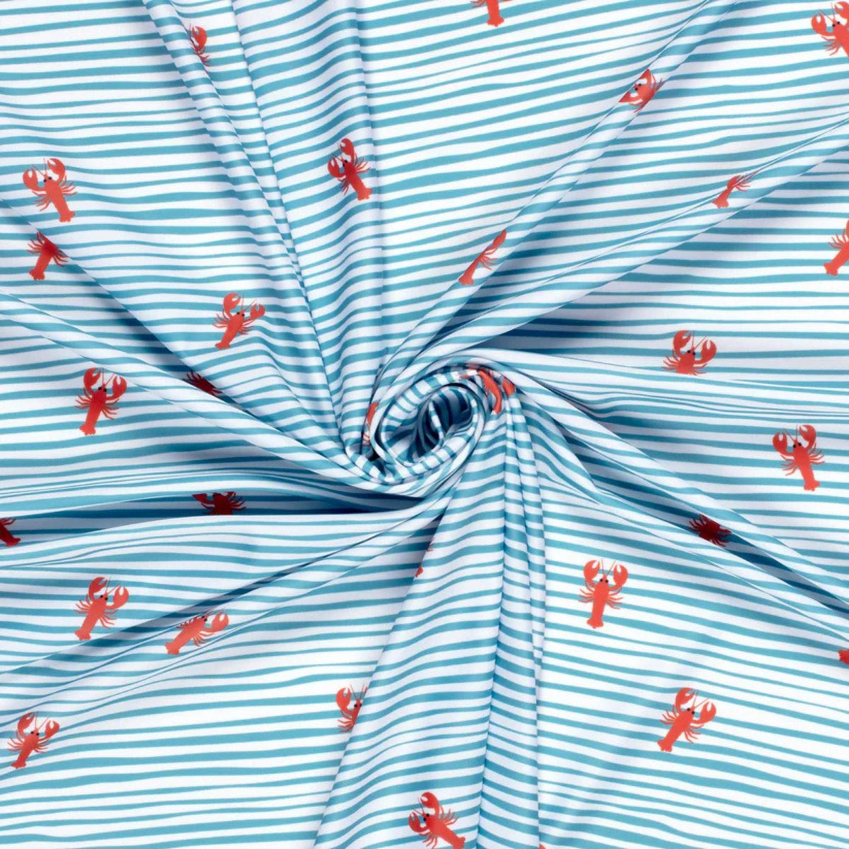 White swim fabric with playful red lobsters and blue wavy stripes – Oeko-Tex certified stretch knit for swimwear, kids’ beachwear, and nautical-themed projects